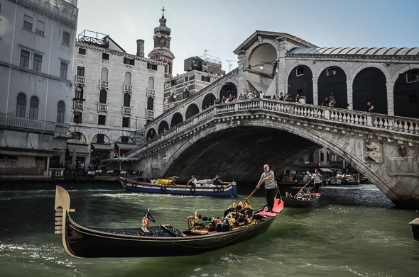 Gondolier Under the Rialto Bridge Venice